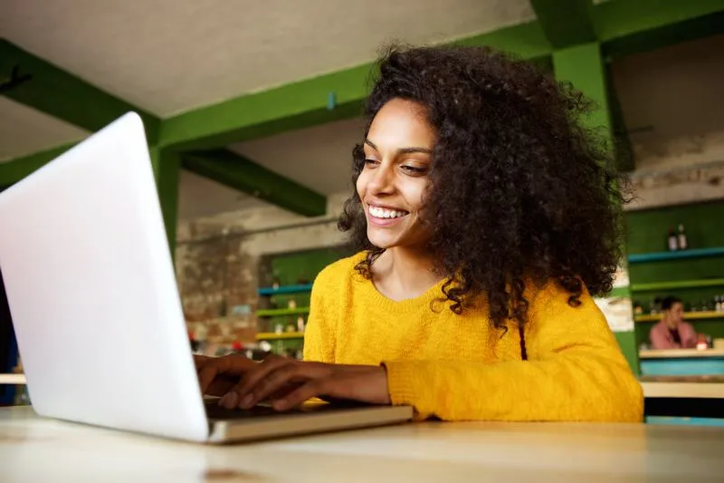 Customer using a laptop for remote computer support