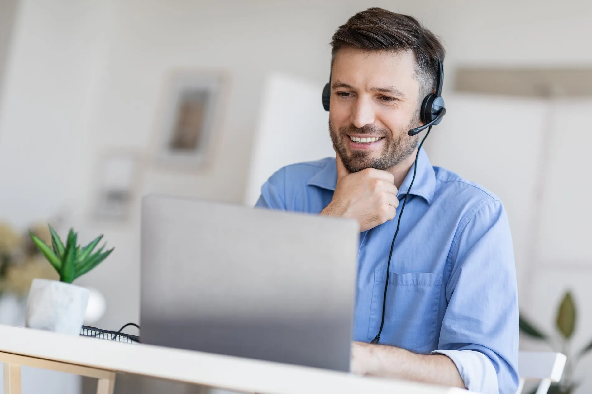 Support technician providing computer help